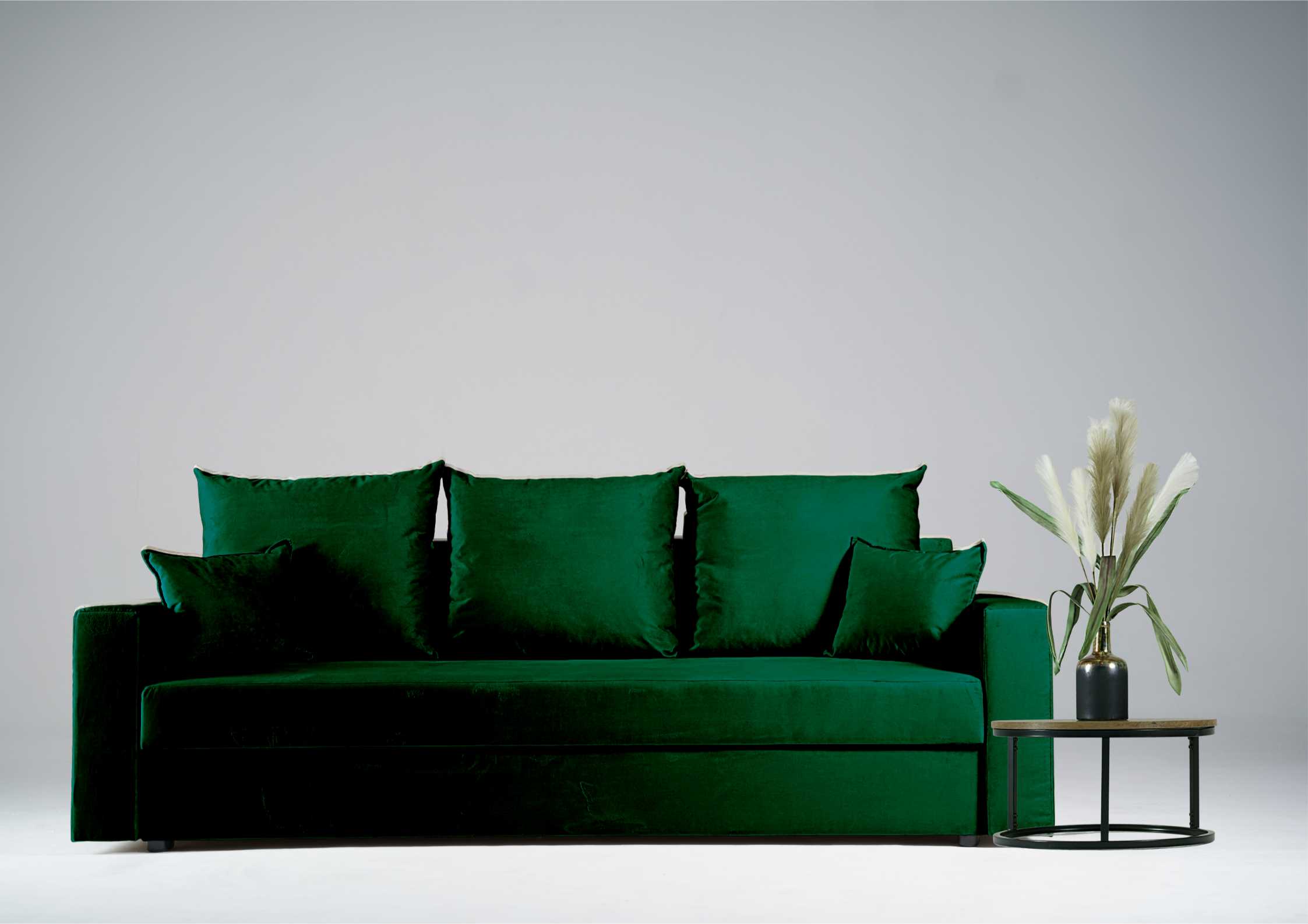 Zielona kanapa rozkładana